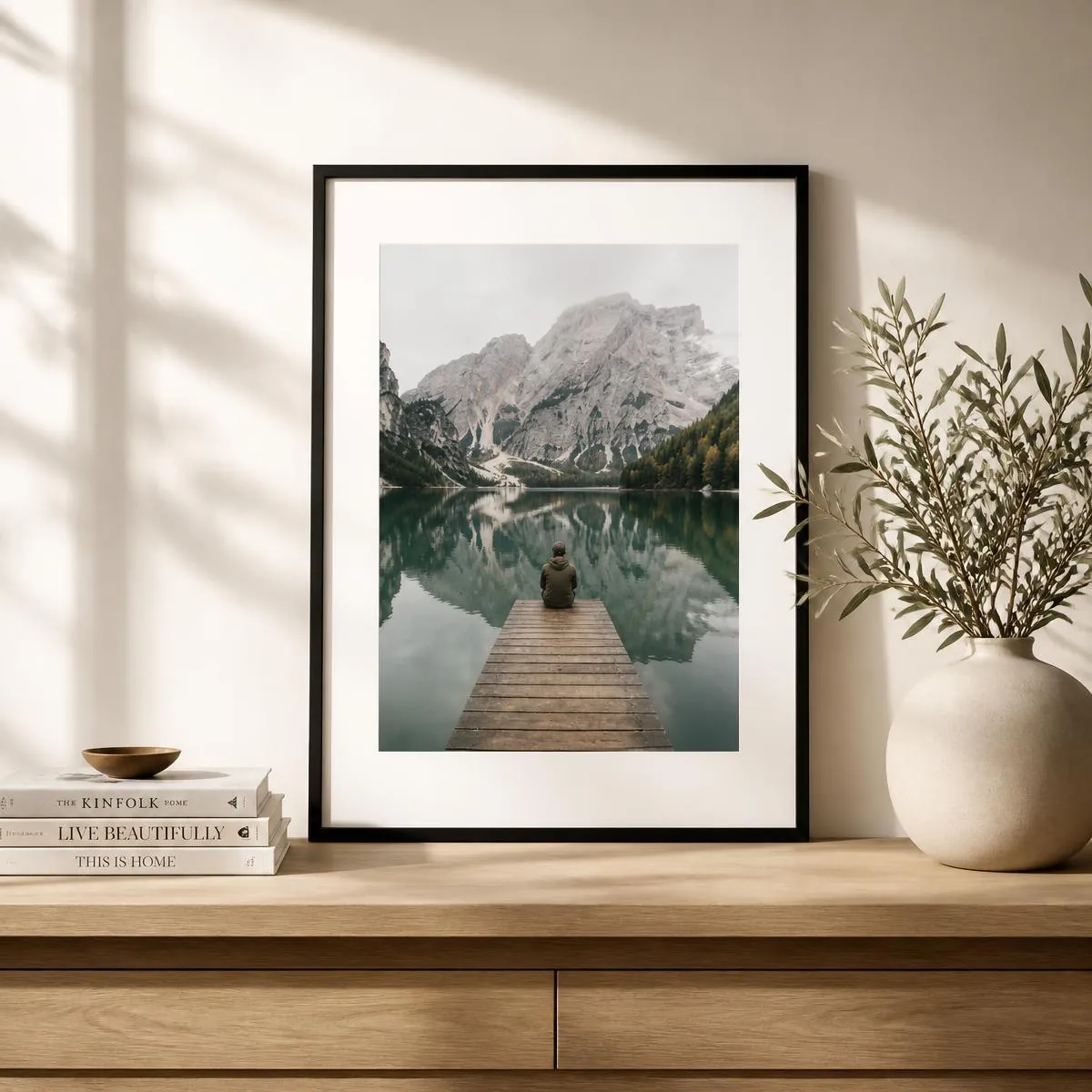 Framed personalised artwork displayed on an oak console table